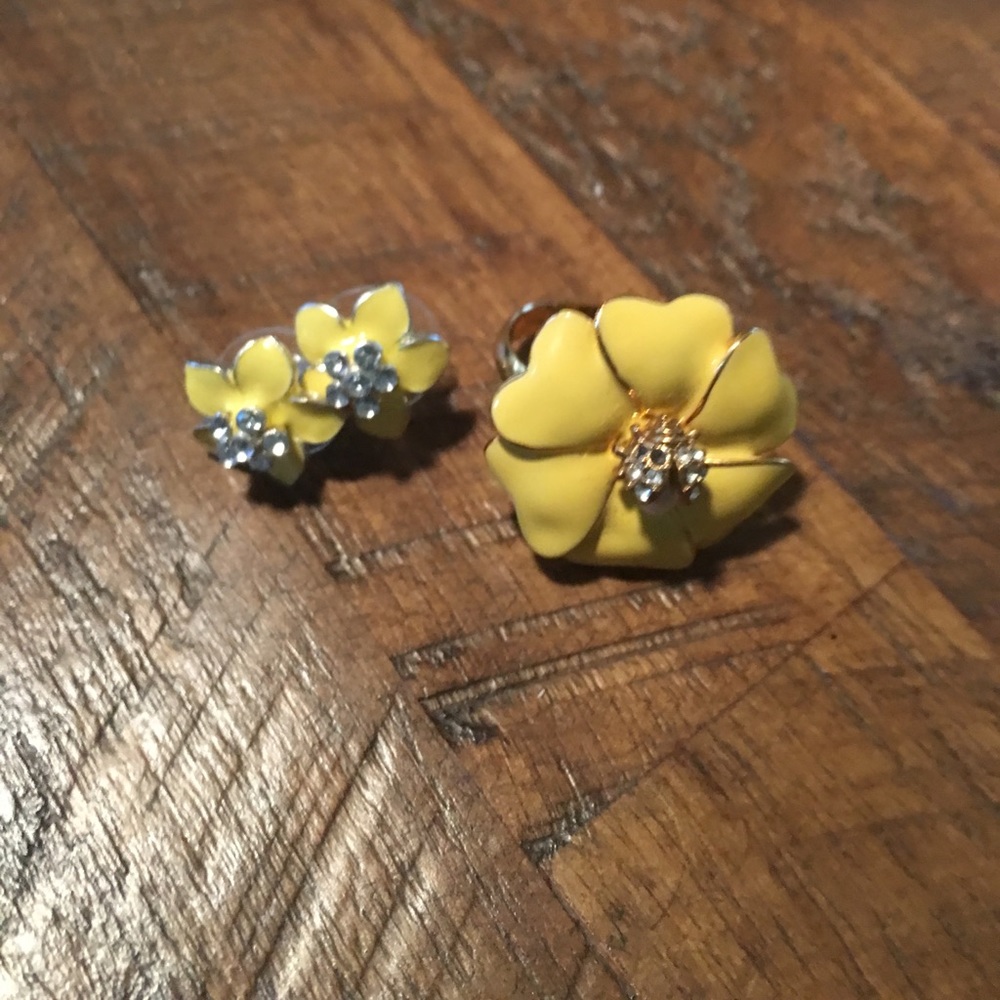 Yellow earrings and ring.